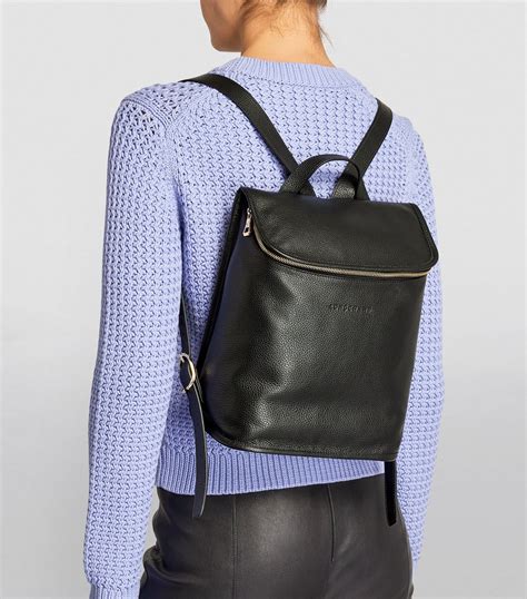 longchamp black leather backpack.